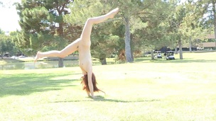 Stripping babe on the lawn in reality movie shows acrobatic moves